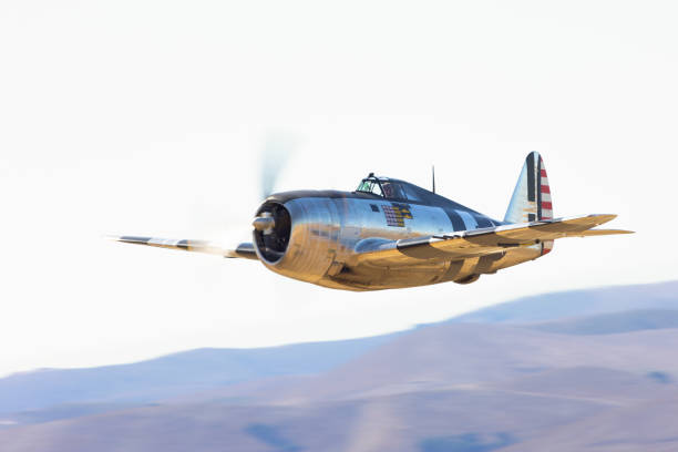 istock Very close view of a P-47G Thunderbolt (WWII American fighter plane)  with its “Invasion Stripes” approaching 2038914073