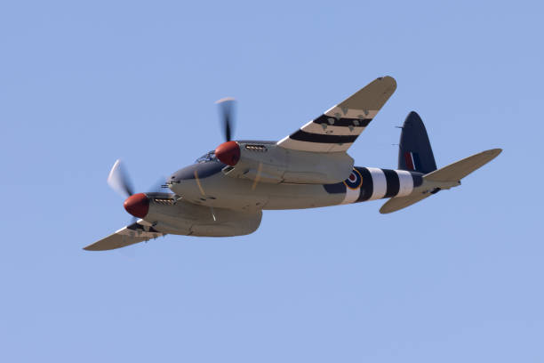 istock Bottom view of a WWII era combat plane (Mosquito)) in beautiful light 2038918307