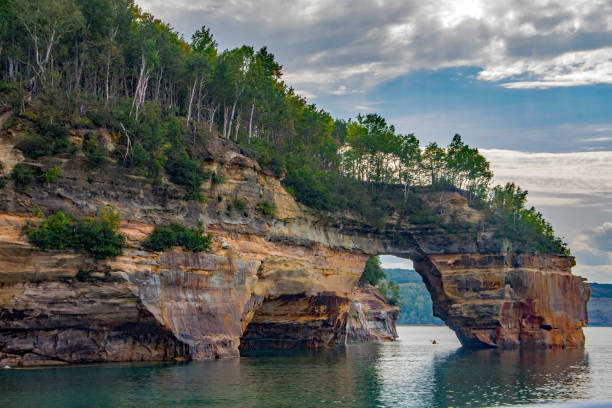 istock Pictured Rocks NL - Natural Arch Tree Covered Bluff 2038966999