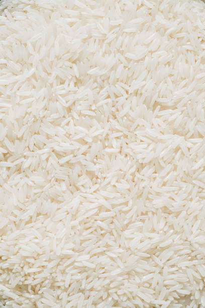 istock Close-Up of White Rice, Edge-to-Edge Texture in a Captivating Monochromatic Composition 2038973408