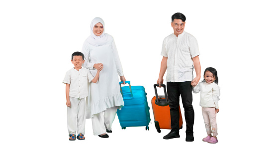 Happy muslim family father mother son daughter with suitcases isolated on white background