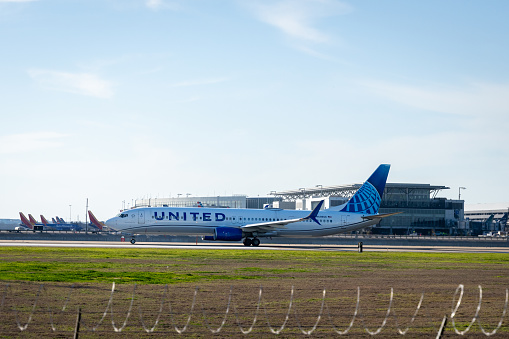 Austin, Texas - February 25, 2024 United airlines plane takes off in front of Austin Bergstrom International Airport High quality photo