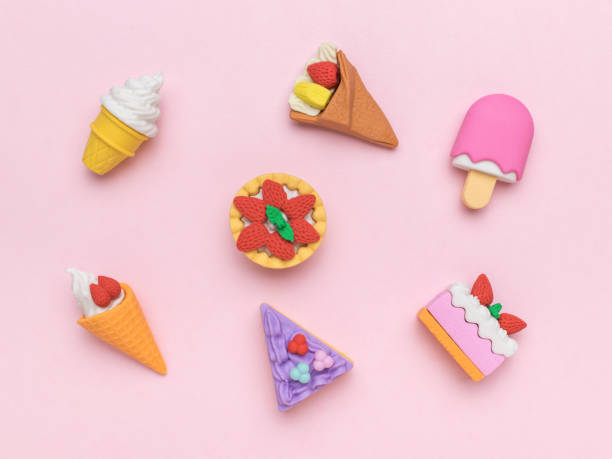 istock Several types of ice cream and cakes on a pink background. 2039118283
