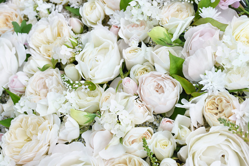 Delicate blooming festive roses and pink summer flowers, blossoming rose flower soft pastel background, bridal bouquet floral card, selective focus