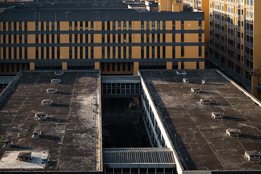 Sunrise sunlight shines on urban residential buildings