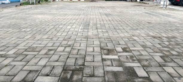 istock View of empty yard. The yard is filled with block paving 2039313298