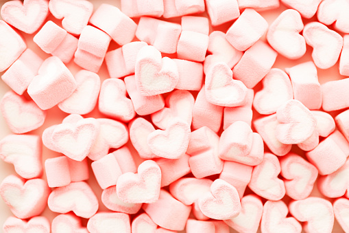 Red and pink candy hearts background. Valentines day and love concept.