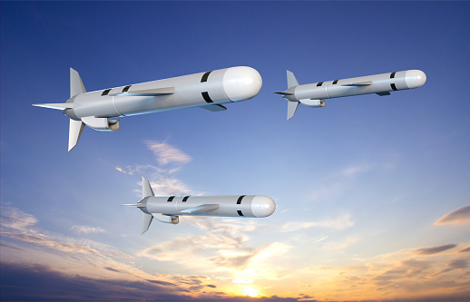 Tomahawk cruise missiles against the sunset. 3d-rendering