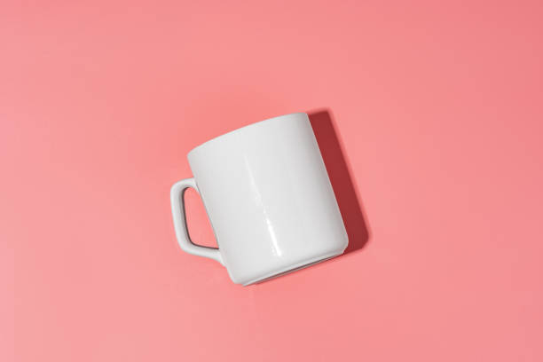 istock Ceramic mug mock up on pink background studio shot 2039469693