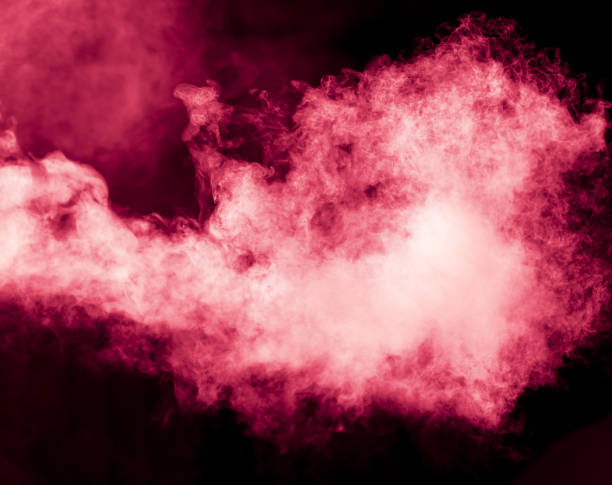 istock Red smoke isolated black background 2039469707