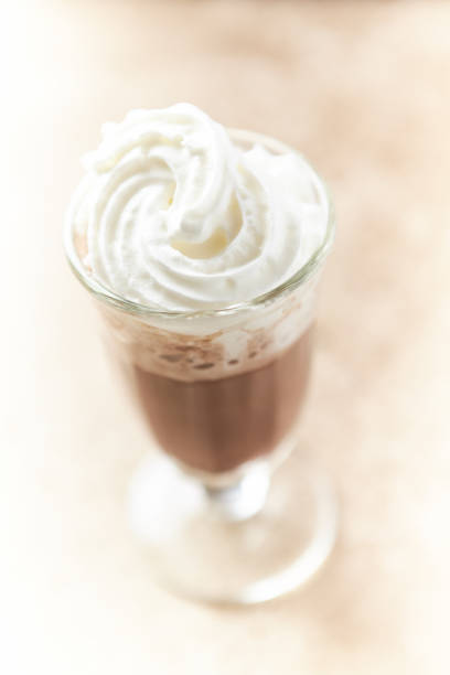 A mocha, or mocha or mogacchino, is a coffee drink similar to a latte, that is, it is made with 1/3 espresso and 2/3 hot milk, but it is different in that it also contains chocolate, usually in the form of chocolate syrup. It can be served either hot or cold with ice, often topped with whipped cream.