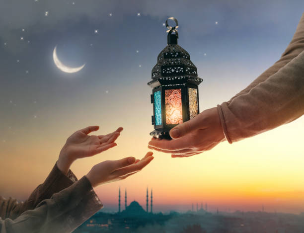 istock Ornamental Arabic lantern with burning candle 2039504920