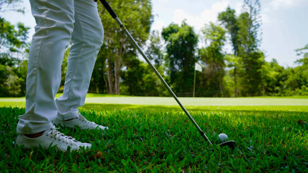 istock Golfer playing golf in the evening golf course, on sun set evening time. 2039537514