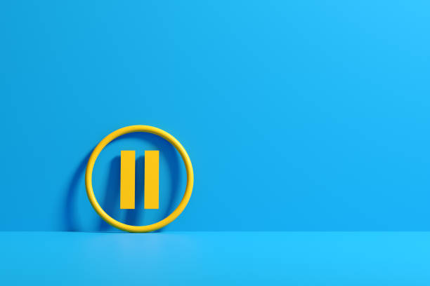 Yellow pause symbol on blue background.