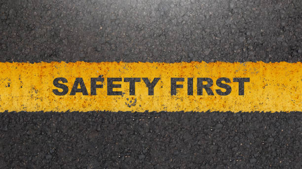 istock 'Safety first' text on the asphalt road 2039581598