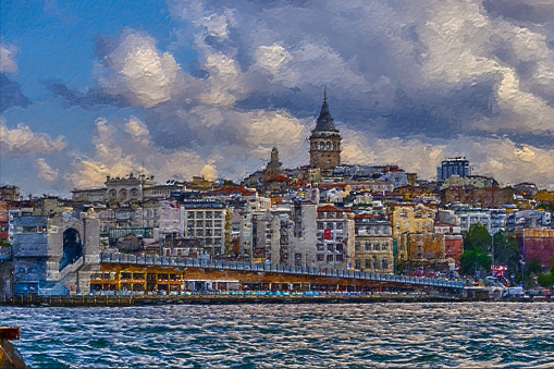 Istanbul, Turkey. Pier Eminonu, Bosphorus, view of the Karakoy district, Galata tower and Galata bridge. Earlier morning, fishermen catch fish on the bridge.