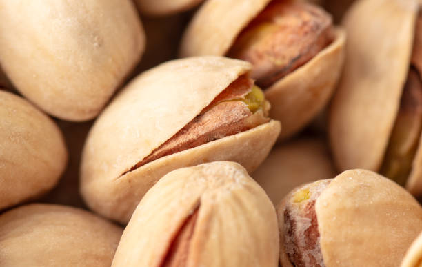 istock Fresh pistachios as a background. Macro 2039618786