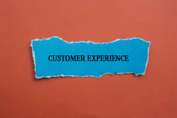 istock Customer experience words written on blue torn paper with color background 2039629861