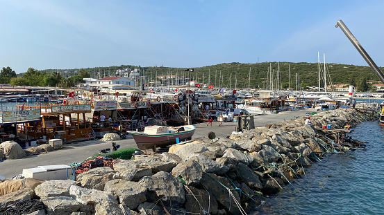 Sigacik, Izmir, Turkey 14 Sept,2023 : Small port of Sigacik with fishing and touristic daily boat tour yatchings. Sigacik is popular tourist attraction in Seferihisar, Izmir, Turkey.