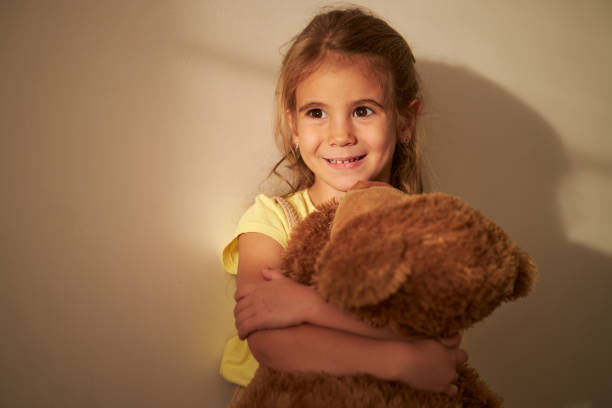 istock Beautiful girl hugging her Teddy Bear 2039674792