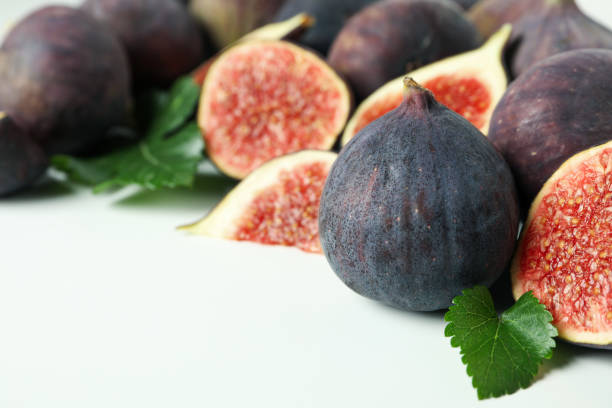 istock Fig with leaves on white background, space for text 2039713684