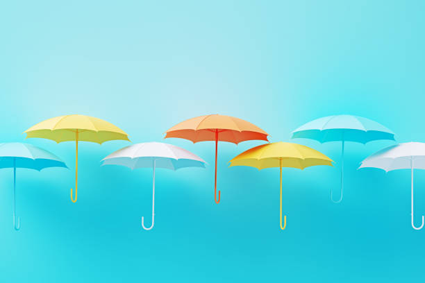 Colorful Umbrellas On Blue Background