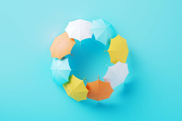 istock Colorful Umbrellas On Blue Background 2039757687