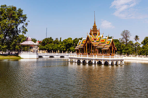 Bang Pa-In , Thailand - July 2, 2015: Bang Pa-In Palace, or the Summer Palace, is a historic complex in Thailand, featuring a mix of Thai and European architecture. Renovated in the 19th century, it's a retreat for Thai royalty, open to the public for tours. Visitors can explore pavilions, gardens, and learn about Thai royal history.