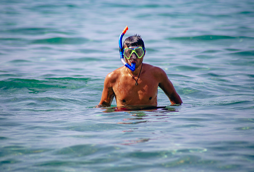 Man with snorkeling  in sea