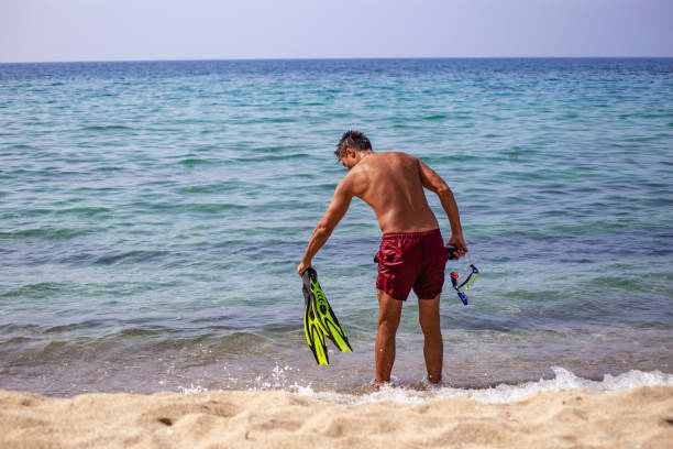 Man with snorkeling  in sea