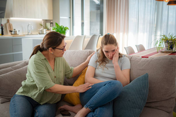 istock Mother comforting crying adolescent daughter 2039834952