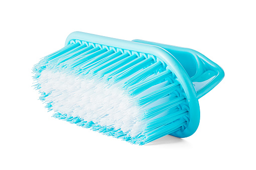 Cleaning brush blue isolated on white background. Low angle view.