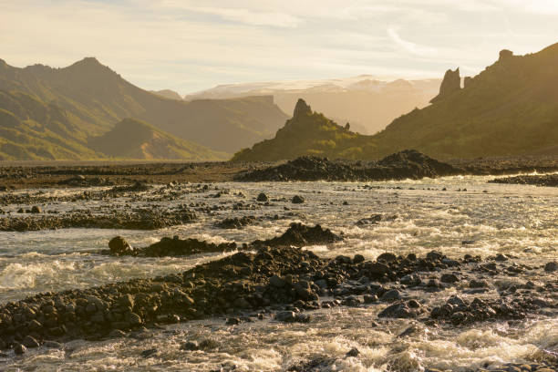 Krossá river flowing through the valley  in Iceland during a beautiful summer afternoon. Landscape photo of the dramatic nature in Iceland.