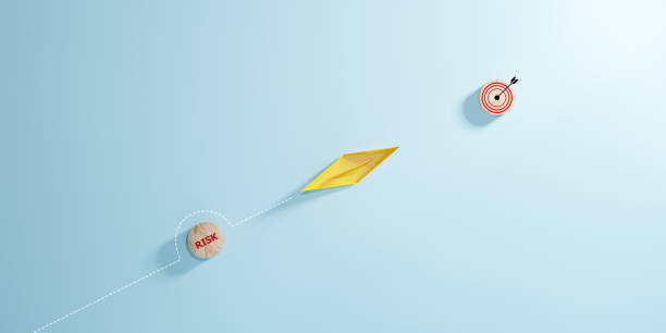 istock Yellow paper boat sails away from the red risk danger for risk assessment and analysis concept. 2039889909