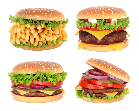 Set of Big Extraordinary Hamburgers with big beef cutlet and onion, isolated on a white background