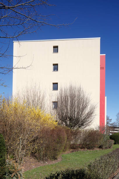 istock Modern, red and white residential building in spring, Findorff, Bremen, Germany 2039913065