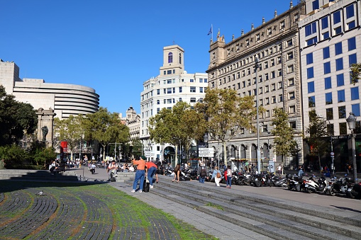 People visit Placa de Catalunya public square in Barcelona, Spain. Barcelona is the 2nd largest city in Spain.