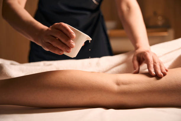 istock Spa practitioner prepping adult woman for holistic massage session 2039938901
