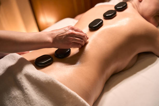 istock Beauty clinic masseuse treating client for back pain 2039938934