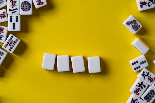 istock mahjong tiles on yellow background 2039948110