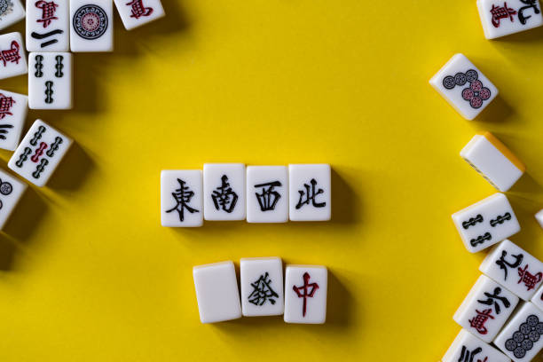 istock mahjong tiles on yellow background 2039948626