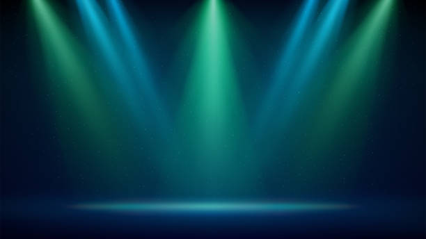 Blue green spotlight backdrop. Illuminated blue green stage. Background for displaying products. Bright beams of spotlights on dark background, glittering particles, a spot of light. Vector Blue green spotlight backdrop. Illuminated blue green stage. Background for displaying products. Bright beams of spotlights on dark background, glittering particles, a spot of light. Vector spotlight stock illustrations
