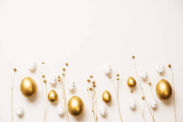 istock Stylish golden eggs easter concept. Easter gold eggs with golden dried flax linum bunch white background. Flat lay trendy easter. Happy easter card. Copy space for text 2039969815