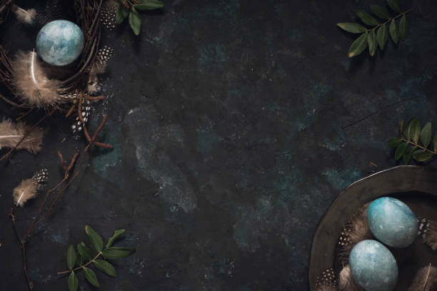 istock Natural dyed blue Easter eggs on dark gray background. Top view point. Easter celebration concept. 2039969905