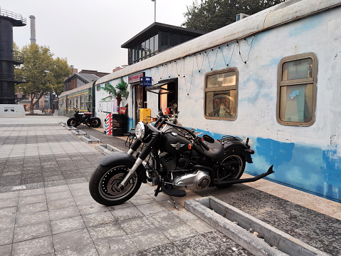 Old railroad car converted as bar at 798 Art Zone, a complex of 50-year-old decommissioned military factory buildings boasting a unique architectural style that houses a thriving artistic community in Dashanzi, Chaoyang District, Beijing.