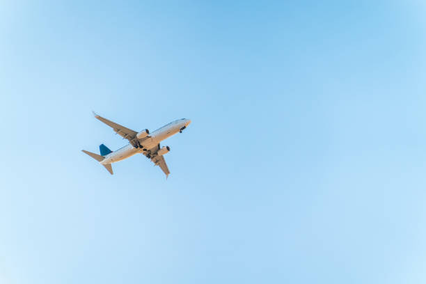 istock Airplane before landing in blue sky, Boeing 737-800 2040010840