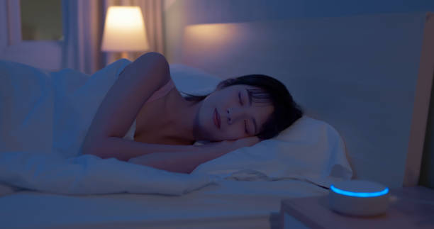 istock asian woman use white noise 2040016252