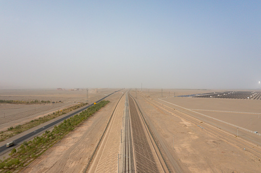 This railway line, swallowed by heat, was photographed in Namibia.