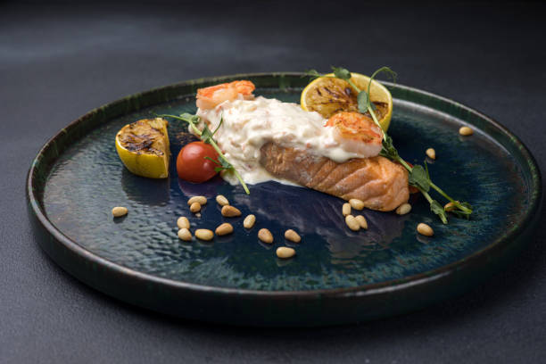 istock Salmon fillet with lemon on a plate 2040036145