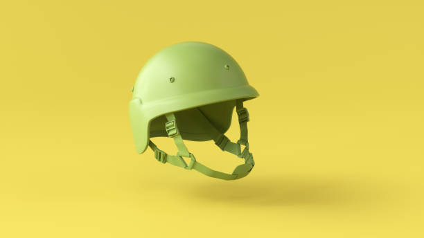istock Green Military Helmet on yellow background. Summertime. 2040056998